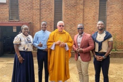 Fr Martin with parishioners after Easter Sunday Mass