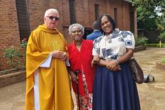 Fr Martin with parishioners after Easter Sunday Mass