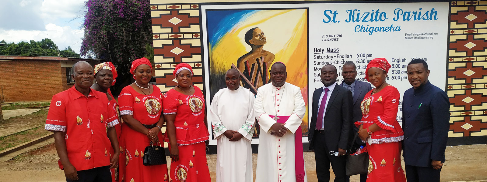 Archbishop George Desmond Tambala with clergy and christians of St Kizito Parish