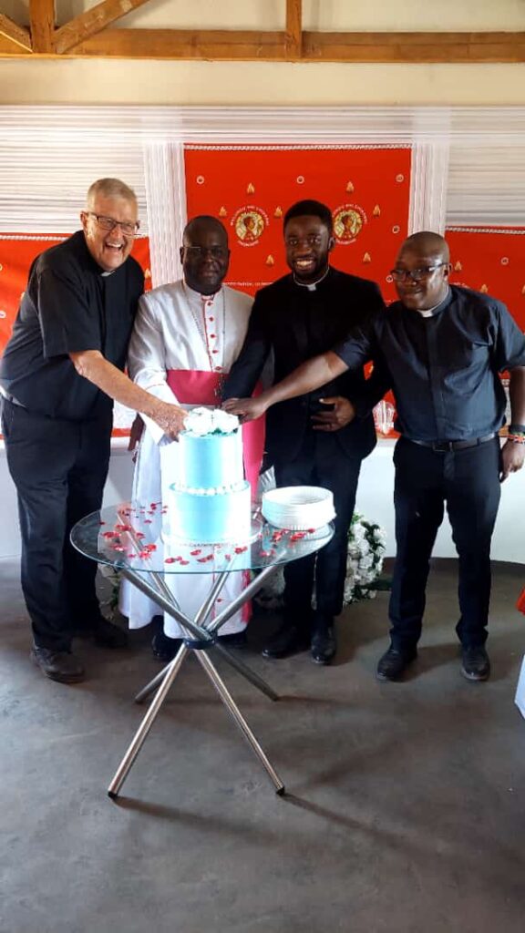 Fr Martin with Fr Frank Taylor, Archbishop George Desmond Tambala and Fr Dennis Agi at Maria Mthandizi wa Akhristu Parish