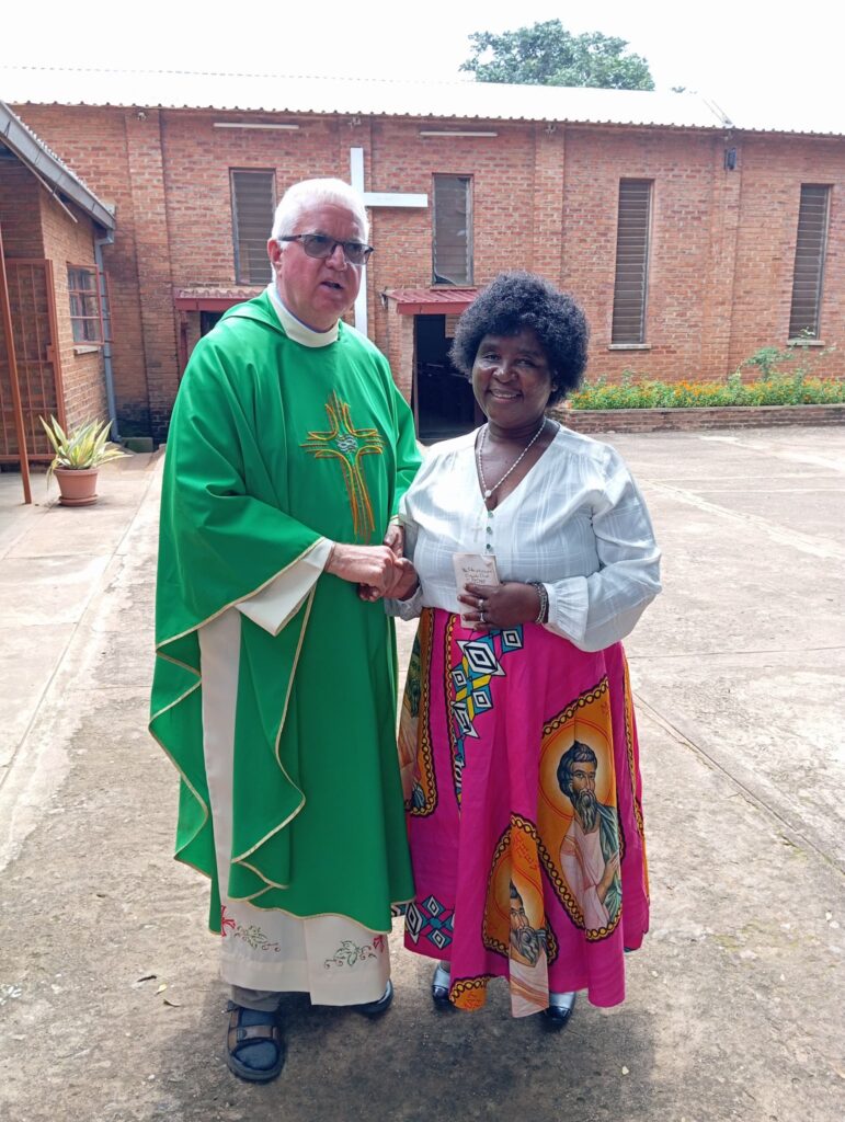 An aunt of Rev Deacon Kennedy Mulande with Fr Martin