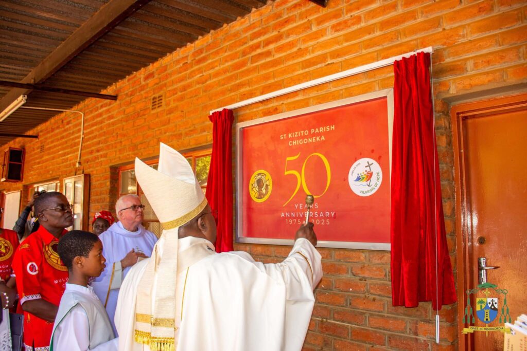 Archbishop George Desmond Tambala unveils the St Kizito Parish Golden Jubilee plaque