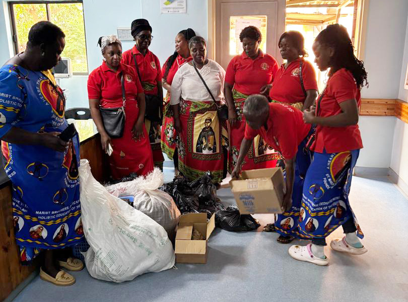 St Dominic Mphakati of St Kizito Parish charity work