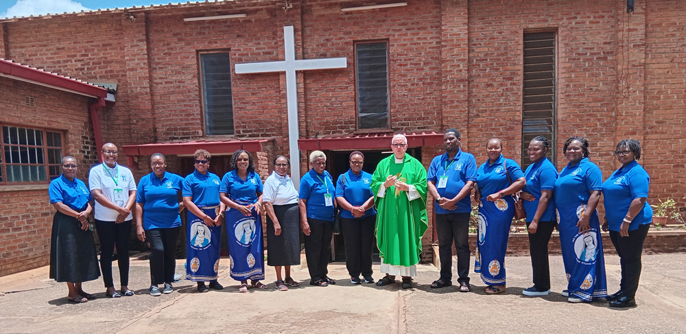 Fr Martin Mulholland with pilgrims on their way to the Kibeho Pilgrimage