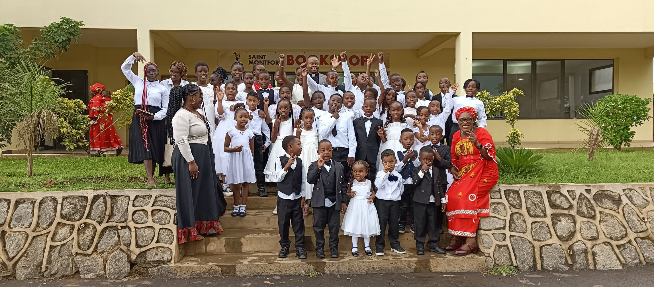 christmas carols children from st kizito parish outside luntha tv