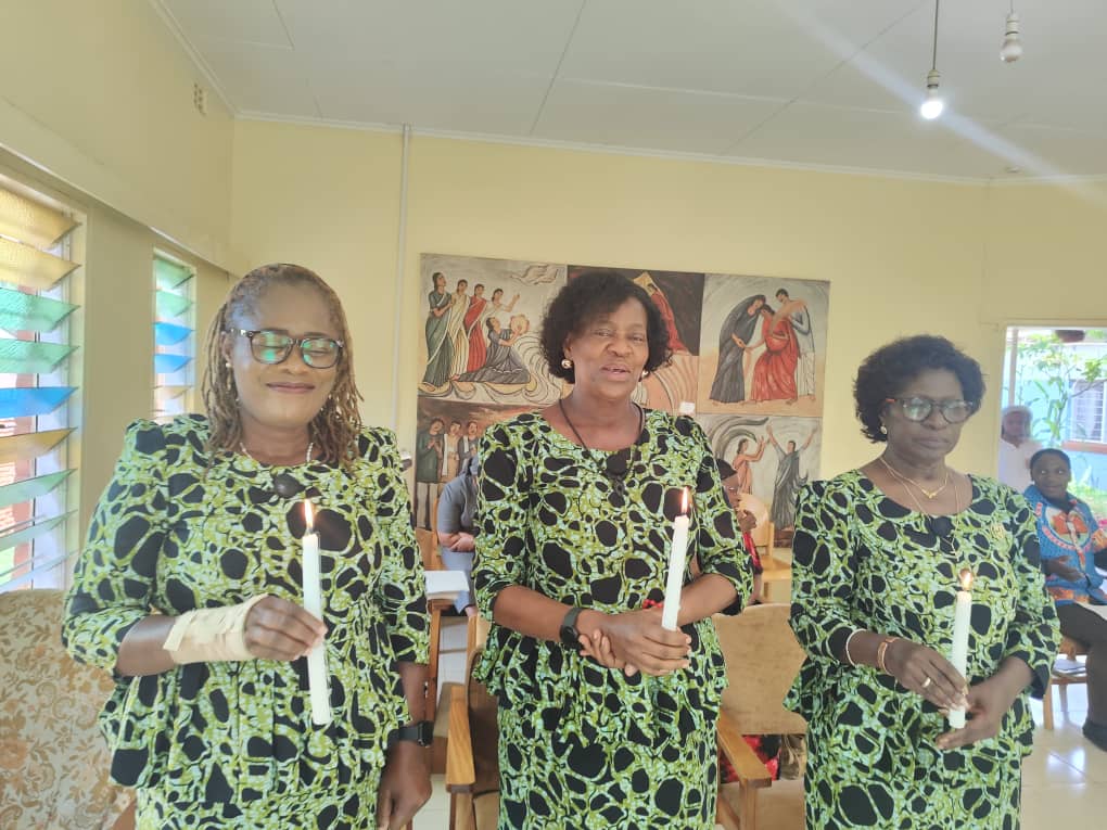 Three parishioners renew their covenant to the mission of the Associate Medical Missionaries of Mary (AMMM). 