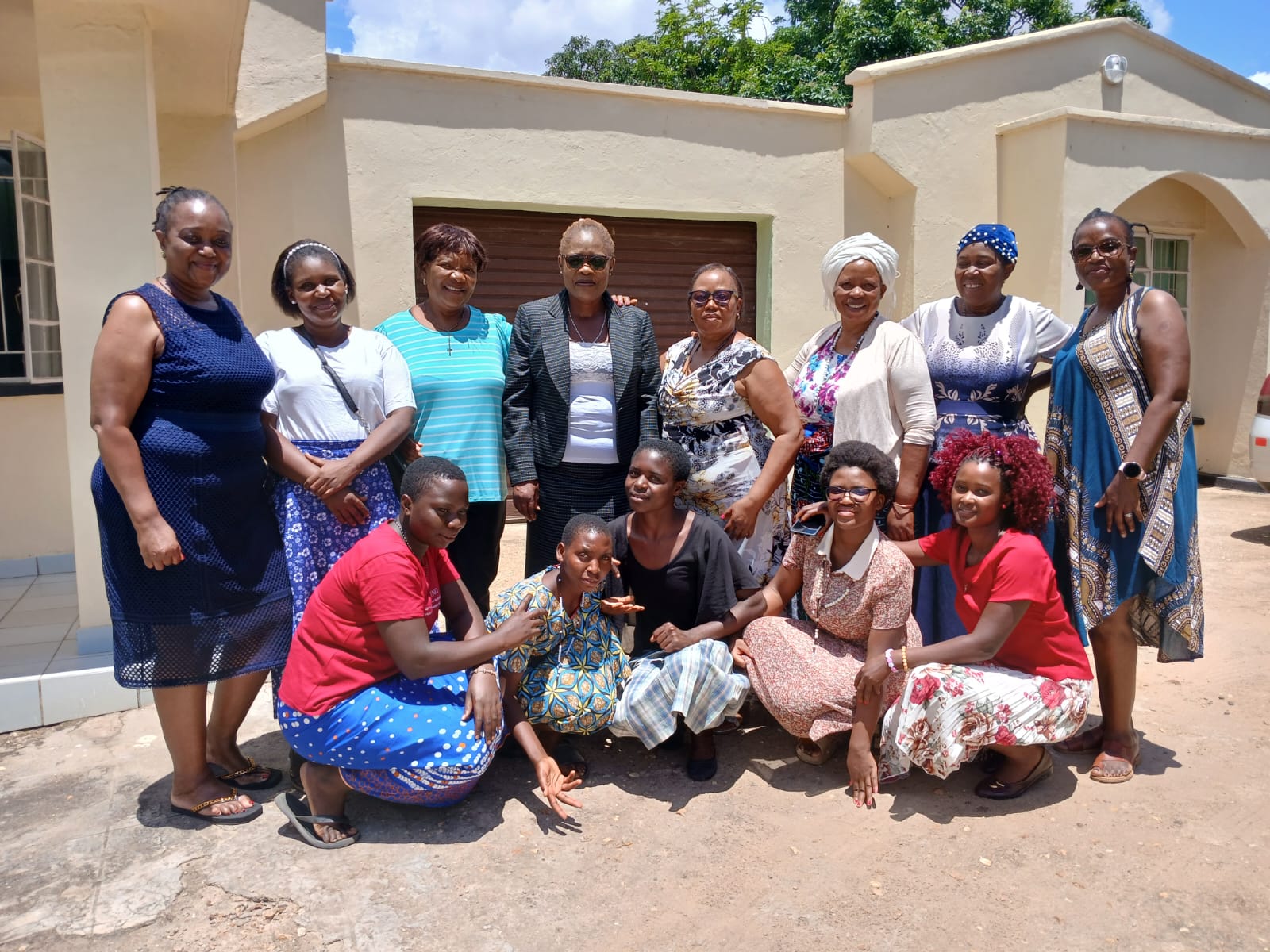 sisters of the holy rosary with women from st kizito parish cooking and bakery course