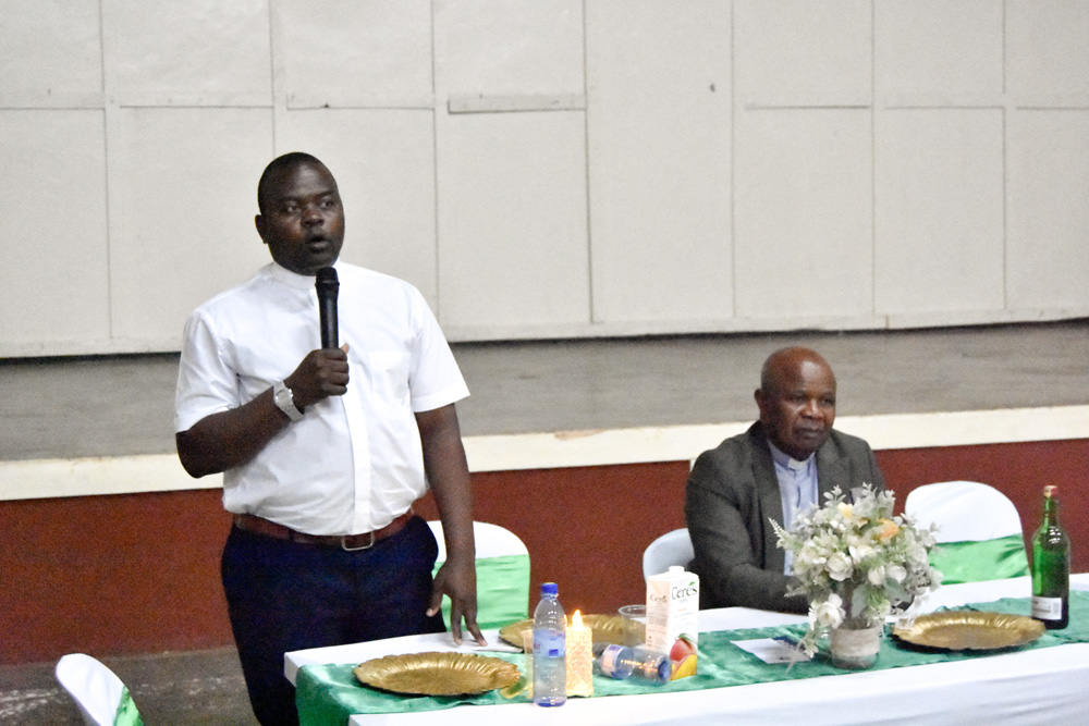 Fr Kennedy Malemia, Dean of Maula Deanery, makes a speech