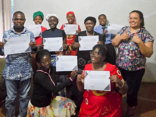 participants with certificates after Focolare Movement Safeguarding and Well-being Awareness Course