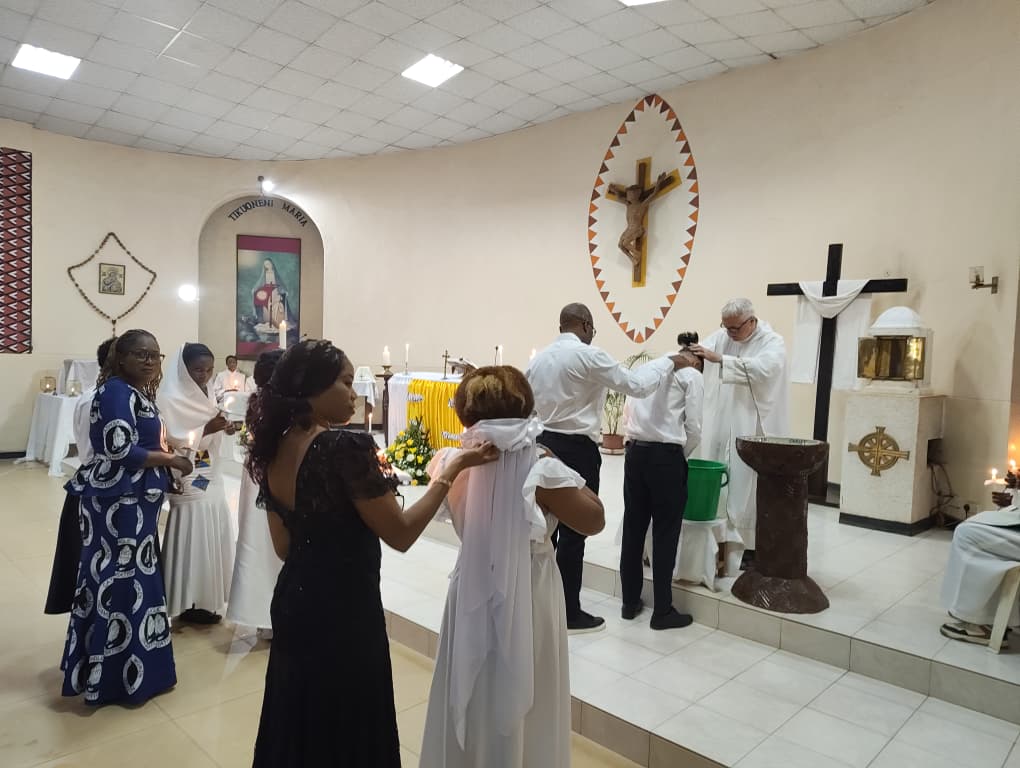adult baptism at st kizito parish on holy saturday