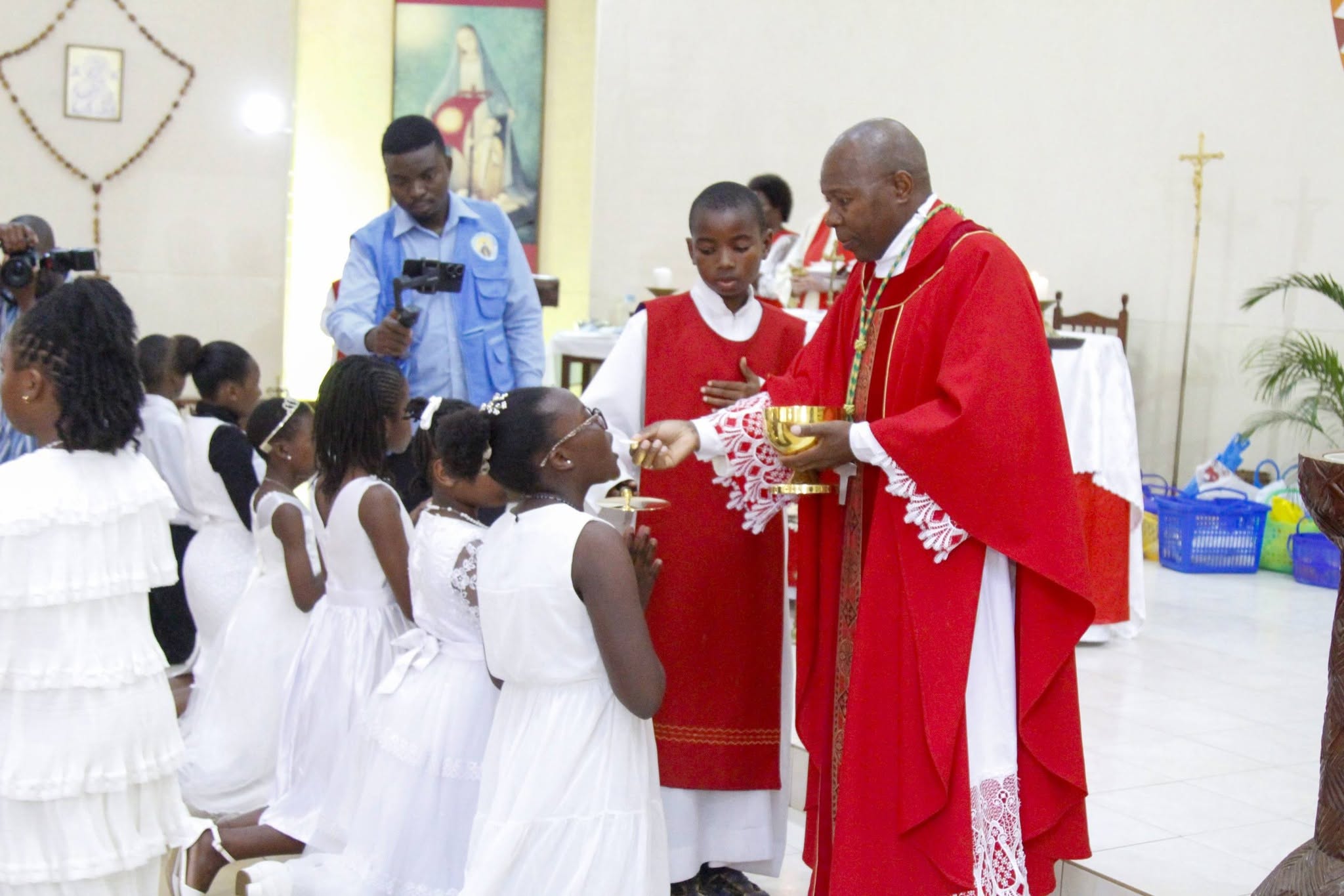Bishop Vincent Mwakhwawa leads St. Kizito Day Celebrations and confirms 23 children