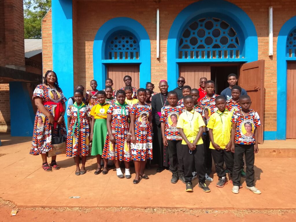 St Kizito Parish Tilitonse Children attend Archdiocesan children's Congress Mchinji with Bishop Vincent Mwakhwawa